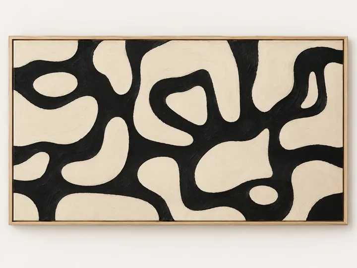 Black and cream shapes, textured canvas, oak frame.