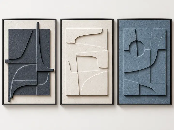 Relief shapes in navy, cream and blue, textured relief, black frames.