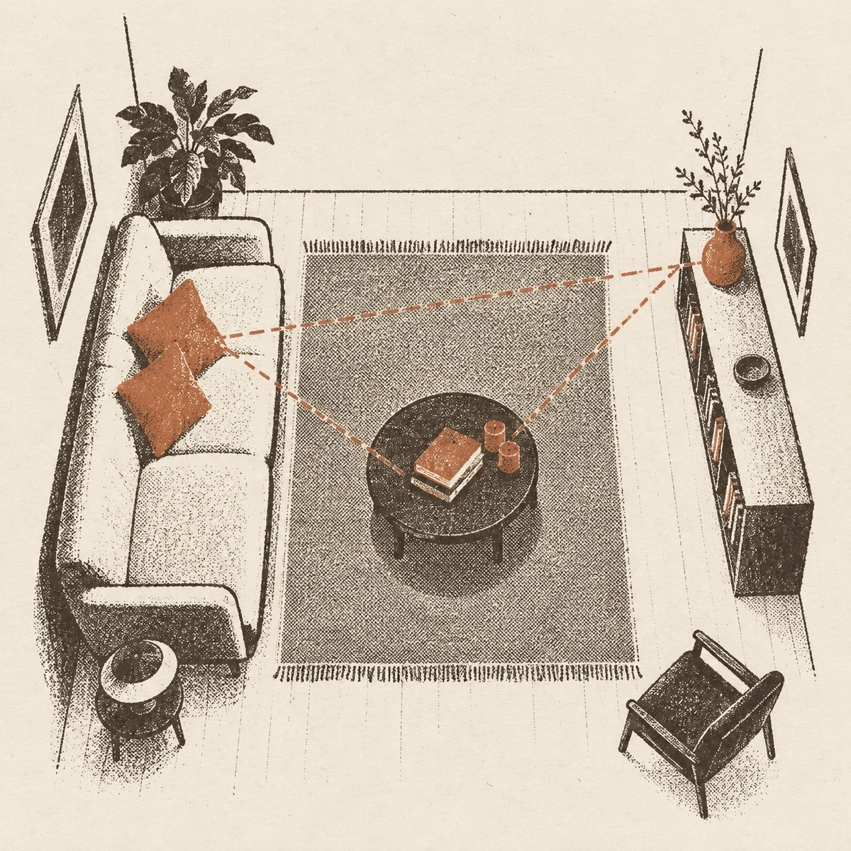 Overhead plan of a small living room. Everything is drawn in dark ink except three things picked out in terracotta: a pair of cushions on the sofa, a vase on the sideboard diagonally across the room, and a book and two candles on the low table between them. A faint dashed line joins the three into a triangle across the floor. The armchair in the bottom corner is still drawn in ink.
