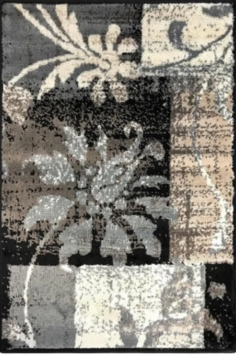 Drawing of the pattern. Blocks of black, warm gray and cream laid like a patchwork, with pale floral shapes bleeding across the seams.